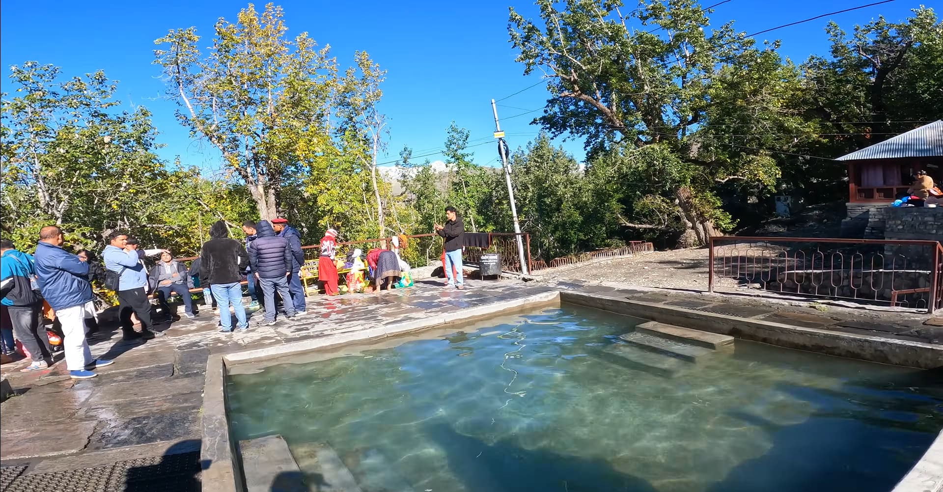 Sacred ponds at Muktinath Temple where pilgrims take a holy dip for spiritual purification before entering the main shrine.