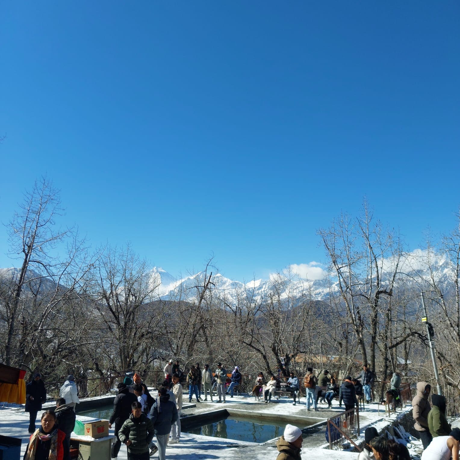 Two sacred ponds at Muktinath Temple, Mustang, Nepal, revered by pilgrims for ritual purification and surrounded by Himalayan scenery.